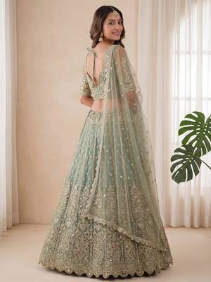 green embroidered soft net lehenga set choli with dupatta 6