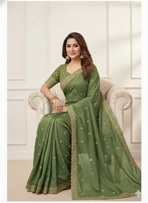 green georgette sequin embroidered saree with blouse 1