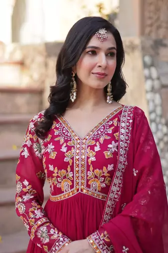 Pink faux blooming embroidery zari work gown