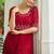 Red designer faux blooming embroidered gown with bead work