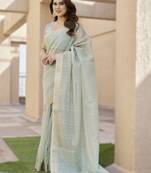Light pista soft tissue linen silk saree with all-over zari linings & rich zari pallu