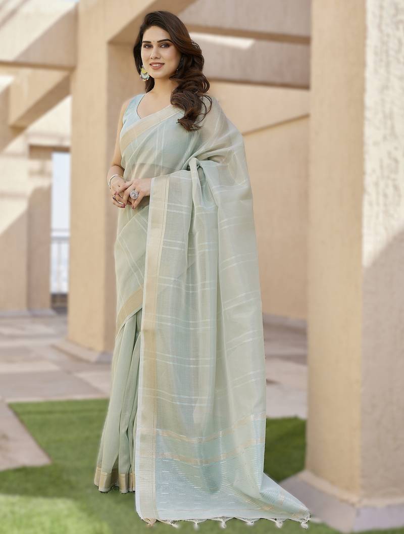 Light pista soft tissue linen silk saree with all-over zari linings & rich zari pallu