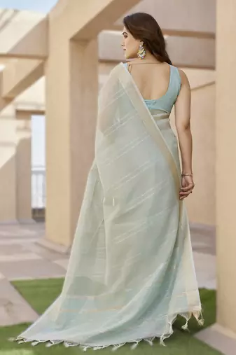 Light pista soft tissue linen silk blend saree with all-over zari linings & rich zari pallu