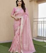 Light pink soft tissue linen silk saree with all-over zari linings & rich zari pallu