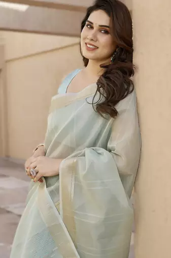 Light pista soft tissue linen silk blend saree with all-over zari linings & rich zari pallu