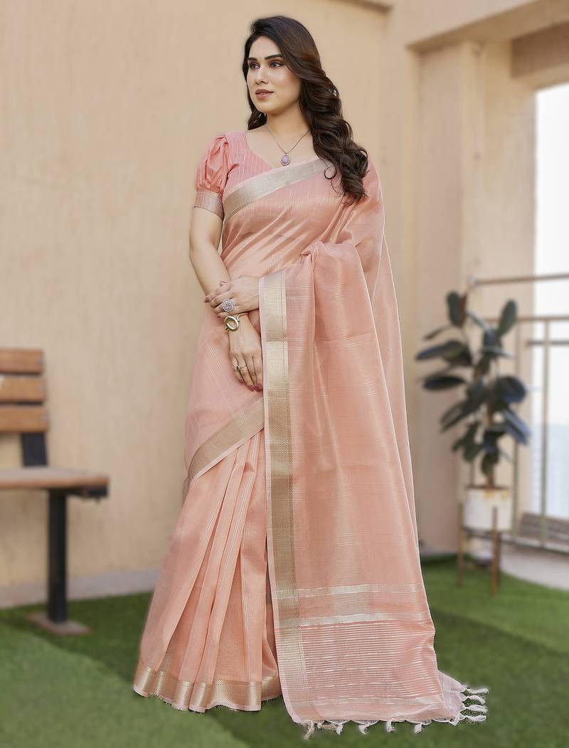 Peach soft tissue linen silk saree with all-over zari linings & rich zari pallu