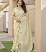 Light yellow soft tissue linen silk saree with all-over zari linings & rich zari pallu