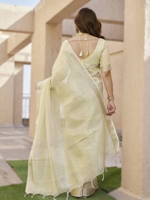 Light yellow soft tissue linen silk blend saree with all-over zari linings & rich zari pallu 2