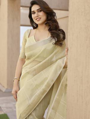 Light yellow soft tissue linen silk blend saree with all-over zari linings & rich zari pallu 3