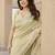 Light yellow soft tissue linen silk saree with all-over zari linings & rich zari pallu