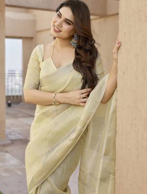 Light yellow soft tissue linen silk blend saree with all-over zari linings & rich zari pallu 4