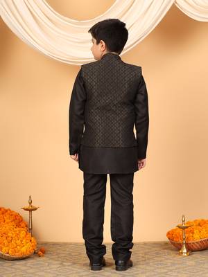 Boys black cotton blend kurta pyjama set with jacquard geometric floral waistcoat 2