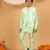 Boys light green cotton silk kurta pyjama set with jacquard elongated pattern waistcoat