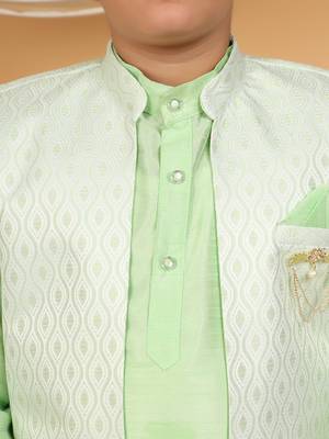 Boys light green cotton silk kurta pyjama set with jacquard elongated pattern waistcoat 3