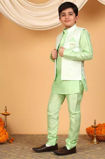 Boys light green cotton silk kurta pyjama set with jacquard elongated pattern waistcoat