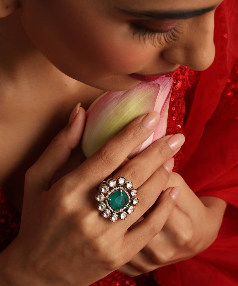 Gold plated kundan green stone ring