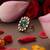 Gold plated kundan green stone ring