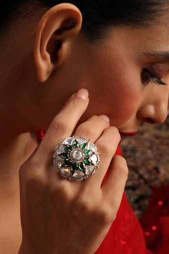 Gold plated kundan green stones ring