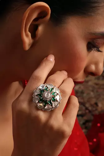 Gold plated kundan green stones ring