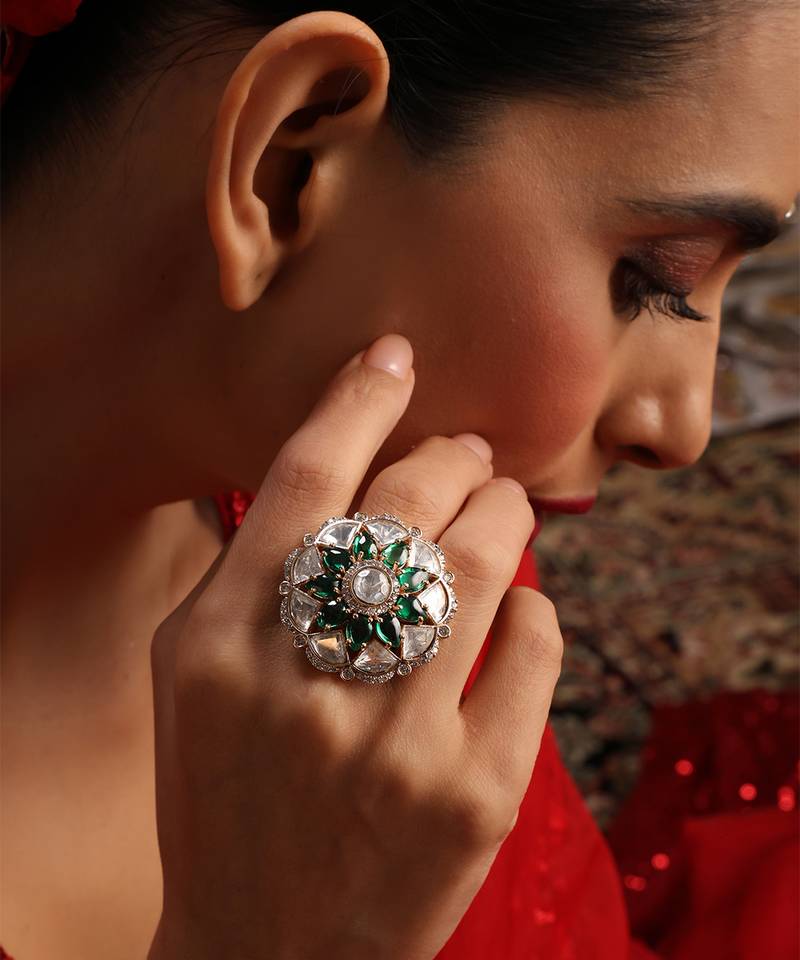 Gold plated kundan green stones ring