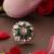 Gold plated kundan green stones ring