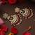 Gold plated kundan red stones chandbali earrings