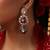 Gold plated kundan multicolor stones dangler earrings