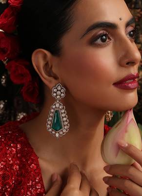 Gold plated kundan green stones dangler earrings 1