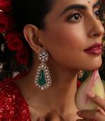 Gold plated kundan green stones dangler earrings