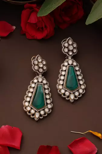 Gold plated kundan green stones dangler earrings