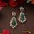 Gold plated kundan green stones dangler earrings