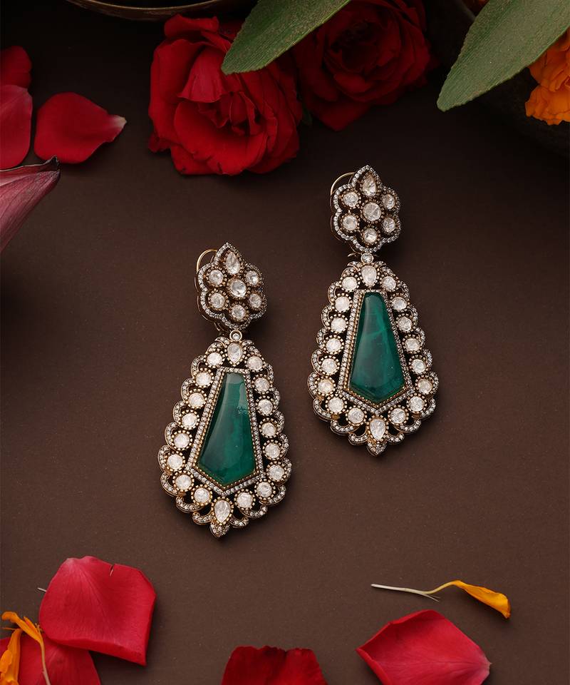 Gold plated kundan green stones dangler earrings