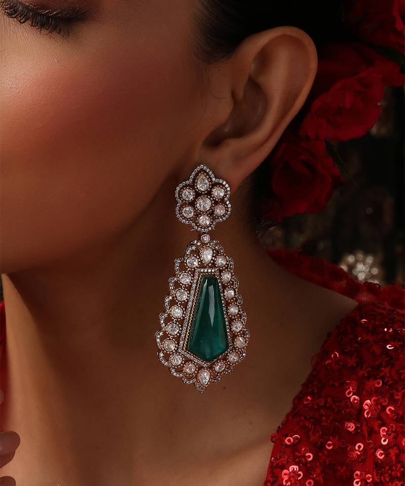 Gold plated kundan green stones dangler earrings