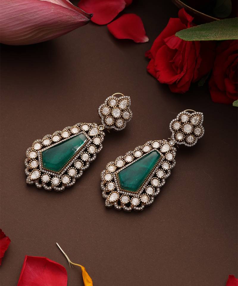Gold plated kundan green stones dangler earrings