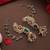 Gold plated kundan green stones jhumkas with ear chain