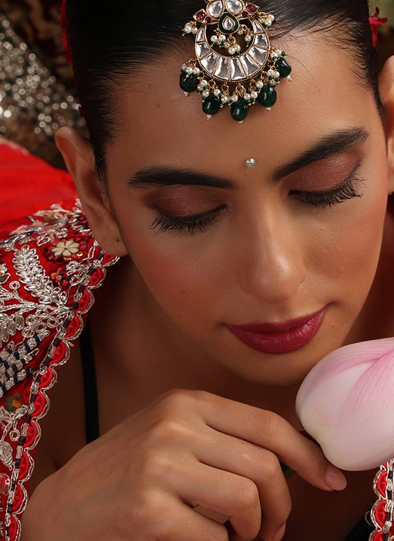 Gold plated kundan green stones maang tikka