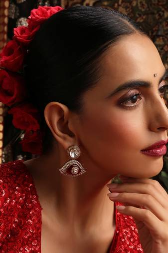 Gold plated kundan red stone earrings