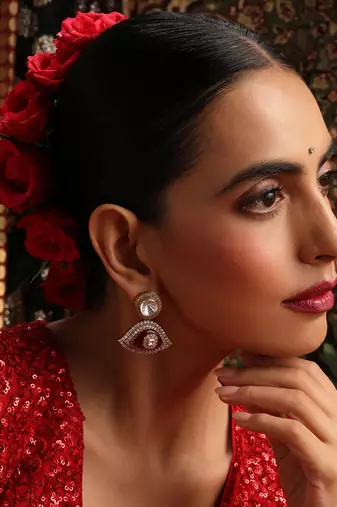 Gold plated kundan red stone earrings