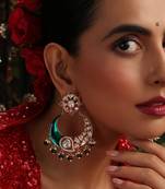 Gold plated kundan green stone chandbali earrings