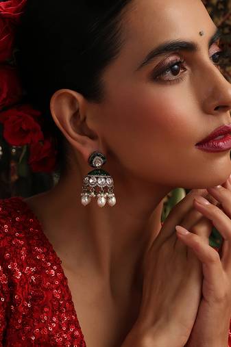 Gold plated kundan green stones jhumkas