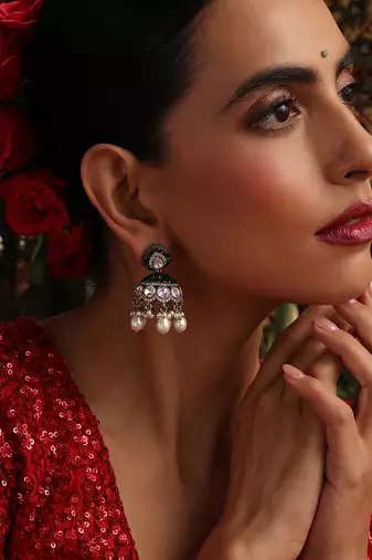 Gold plated kundan green stones jhumkas