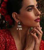 Gold plated kundan green stones jhumkas