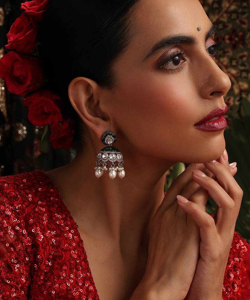 Gold plated kundan green stones jhumkas