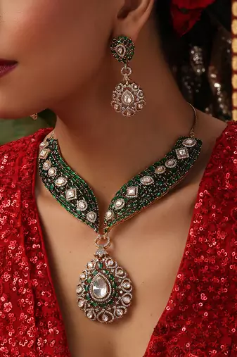 Gold plated kundan green stones necklace set