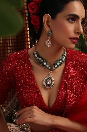 Gold plated kundan green stones necklace set