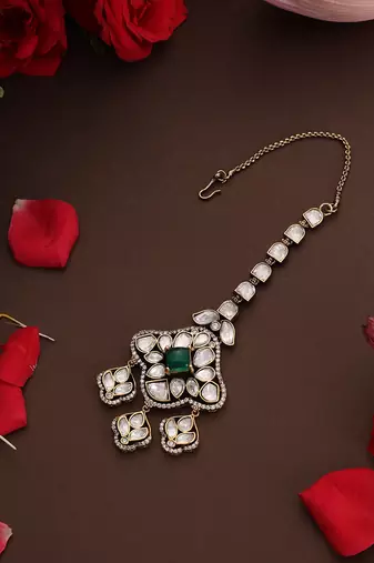 Gold plated kundan green stone mang tikka