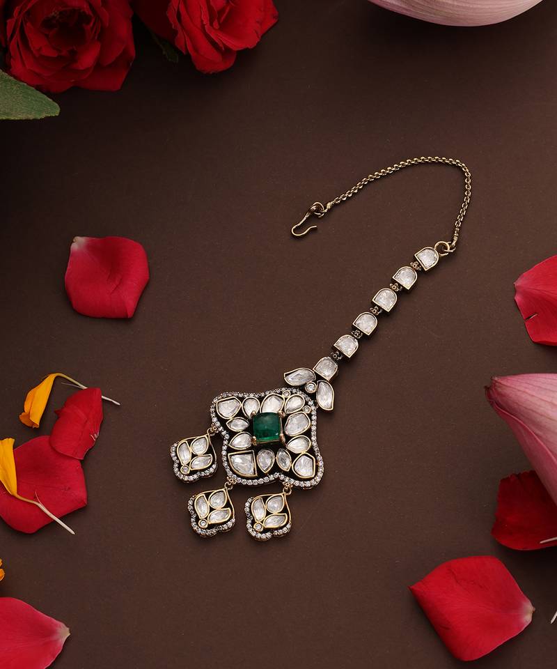 Gold plated kundan green stone mang tikka