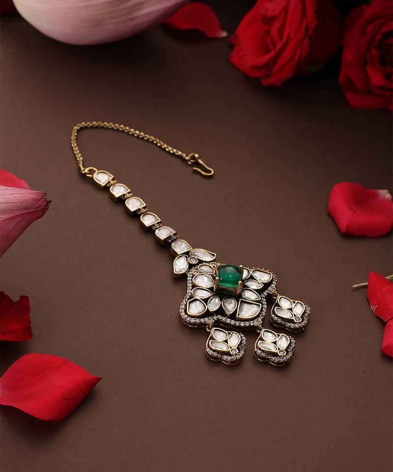 Gold plated kundan green stone mang tikka