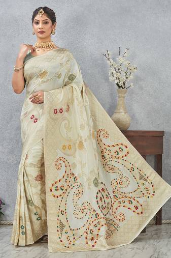 designer off white zari weaving tassel pallu work silk blend saree