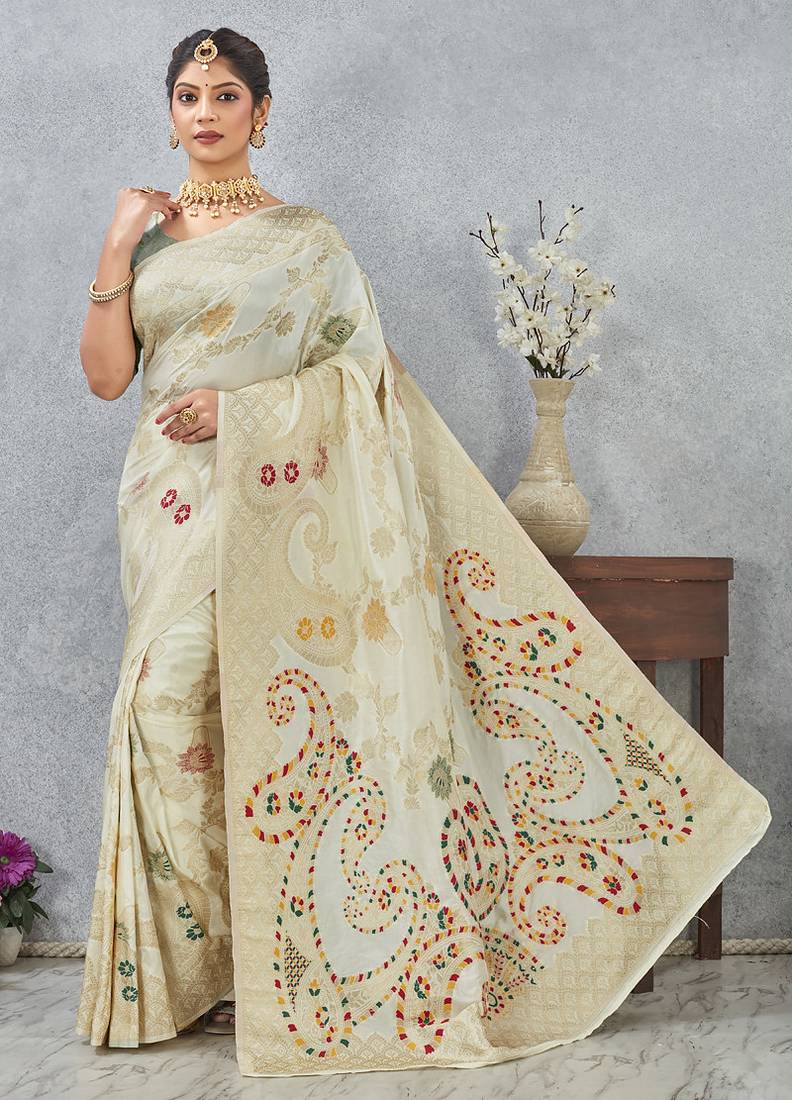 designer off white zari weaving tassel pallu work silk blend saree